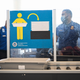 A Transportation Security Administration (TSA) agent screens carry-on baggage at Los Angeles International Airport (LAX) in Los Angeles, California, on August 10, 2022.